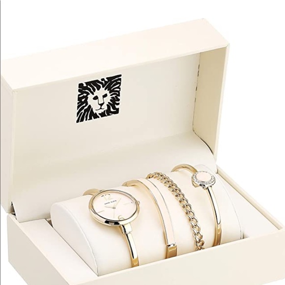 Free necklace with purchase.Gold and pink watch - Picture 2 of 3